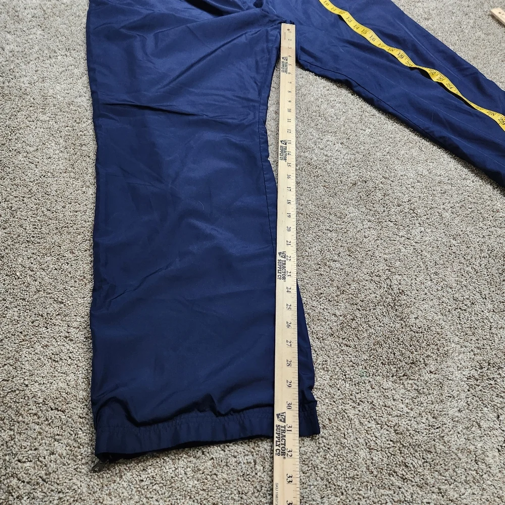 Men's Blue Under Amour Loose Athletic Pants with White Side Stripe and Zipper